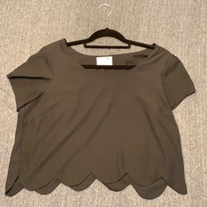 Loose fitting crop top with scalloped bottom